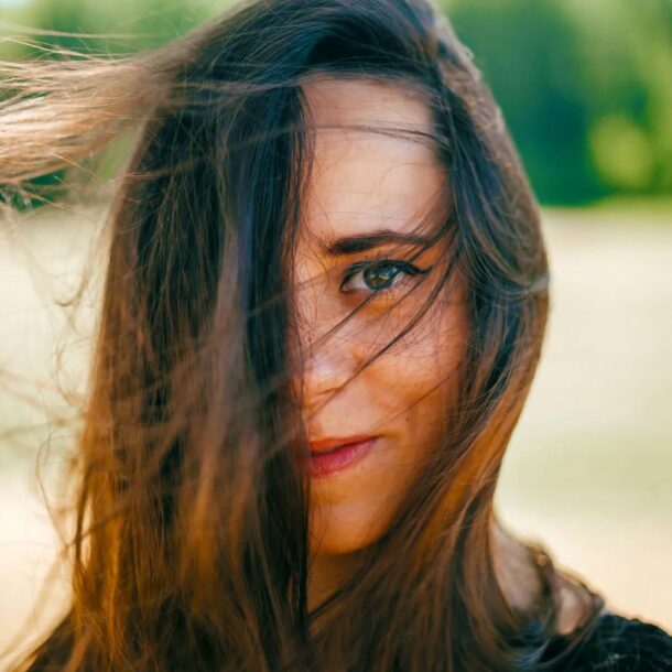 woman smiling from comfort of doing the havening technique.